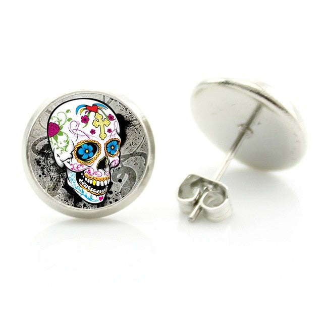 A statement pair of Sugar Skull Stud Earrings on a white background.