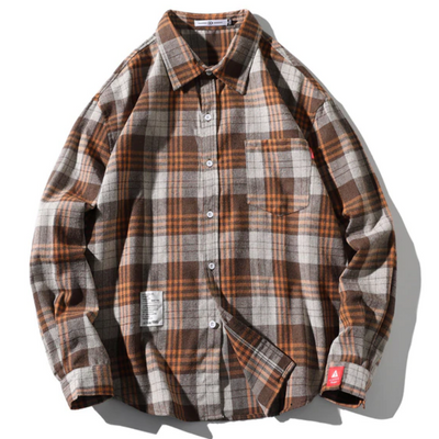 A Men's Classic Plaid Flannel Shirt, Yellow in shades of brown and beige, featuring a front pocket and button-up closure. This extra thick and cozy shirt from the American Legend Ride flannels collection is displayed flat on a white background.